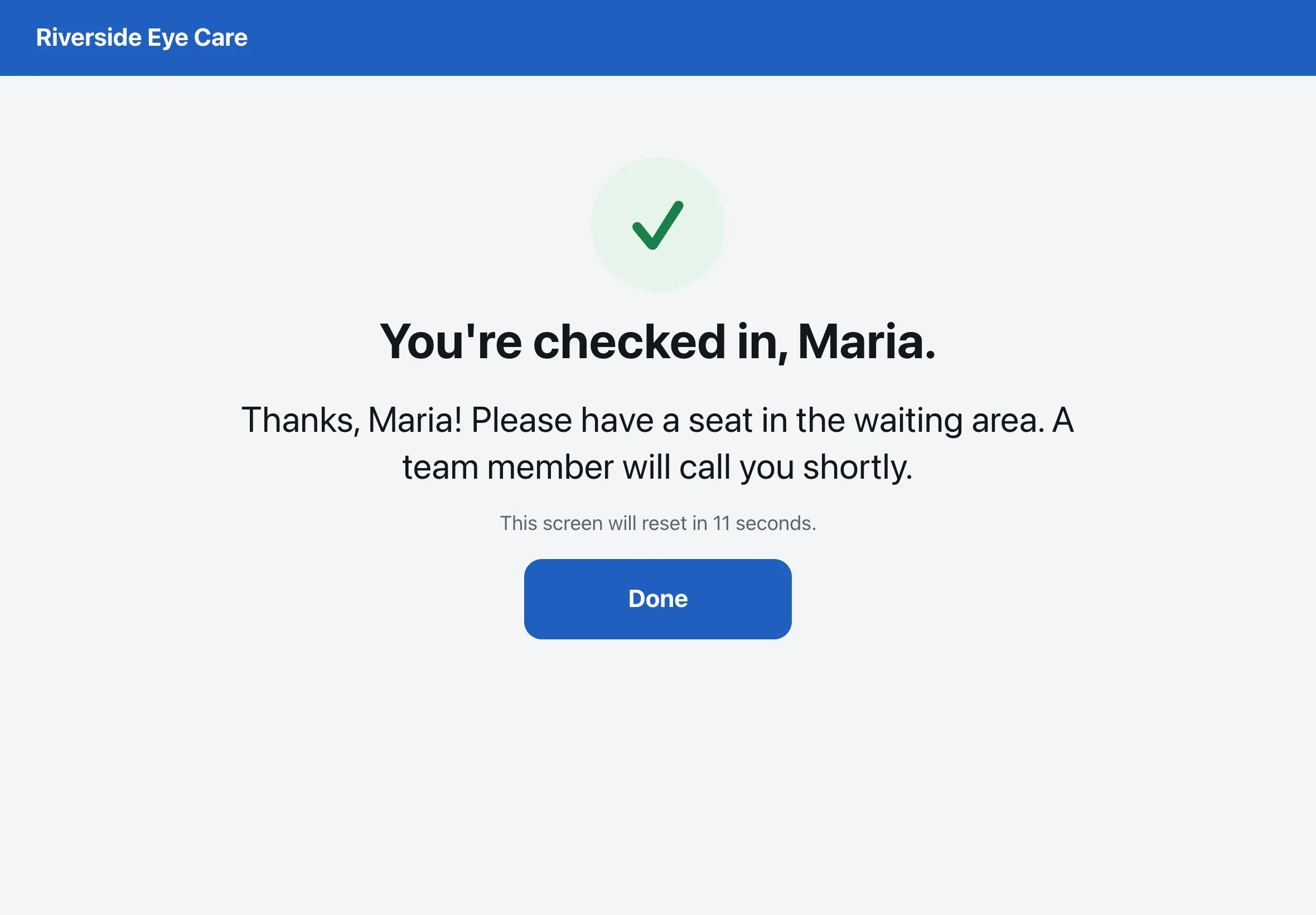 Kiosk confirming check-in and telling the patient where to wait